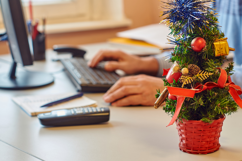 mini christmas tree on office desk